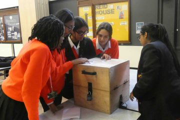 Students at Norbury High School for Girls negotiate a maths escape room challenge for NSPCC Number Day 2024